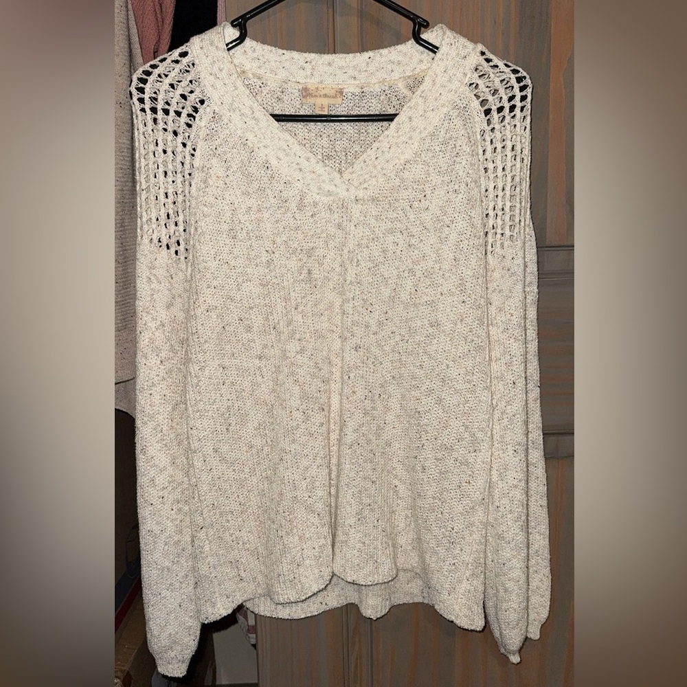 Hem and Thread Sweater